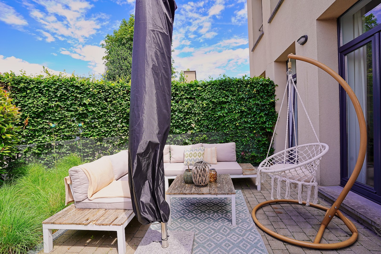Prachtig gelijkvloers appartement met terras en tuin in het centrum van Buggenhout - foto 5