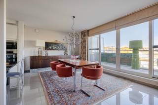 Luxury penthouse with open views and a cozy terrace, fully move-in ready. Conveniently located within walking distance of the city...