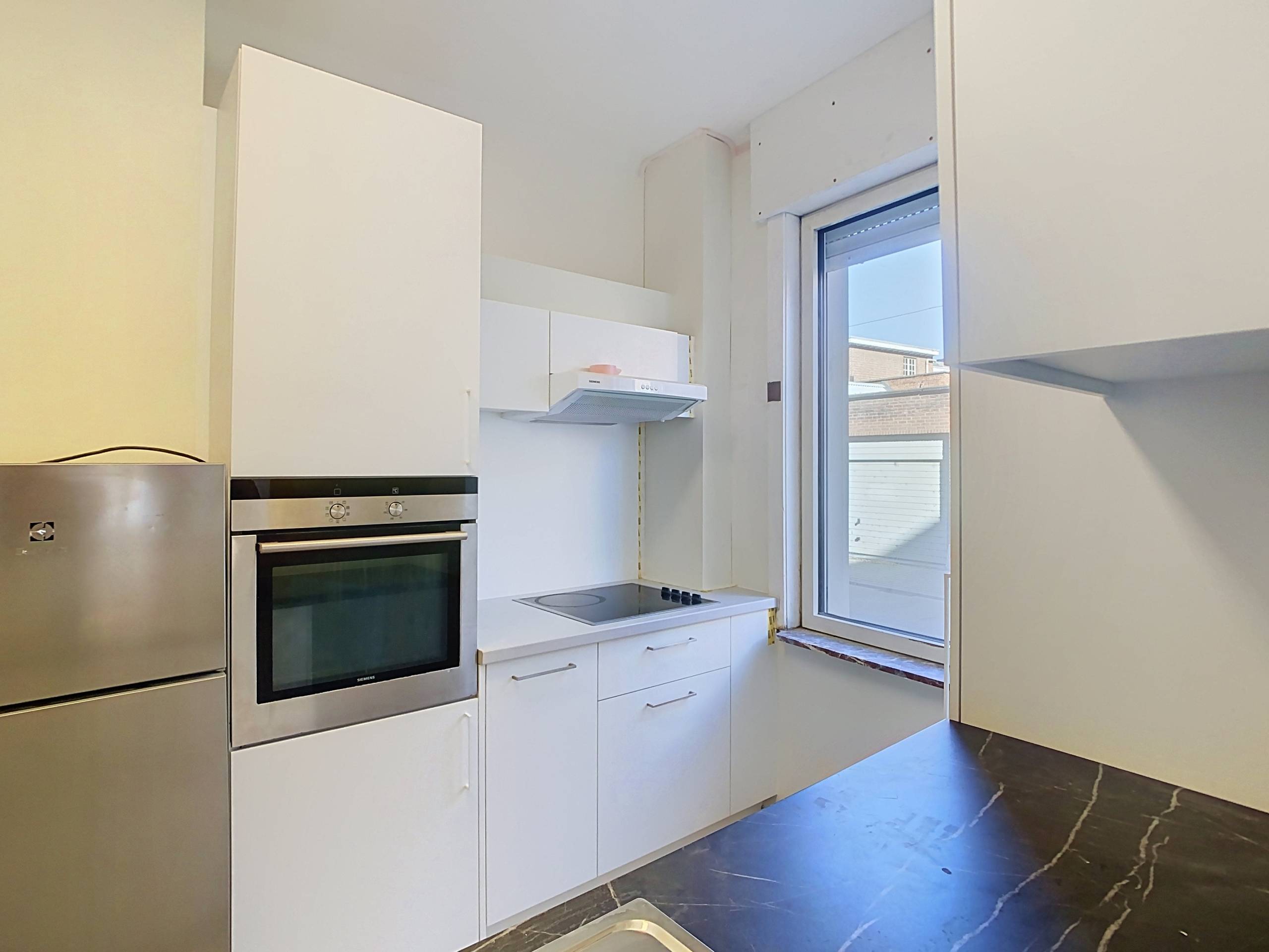 Beautifully renovated apartment in the heart of Leuven! - photo 5