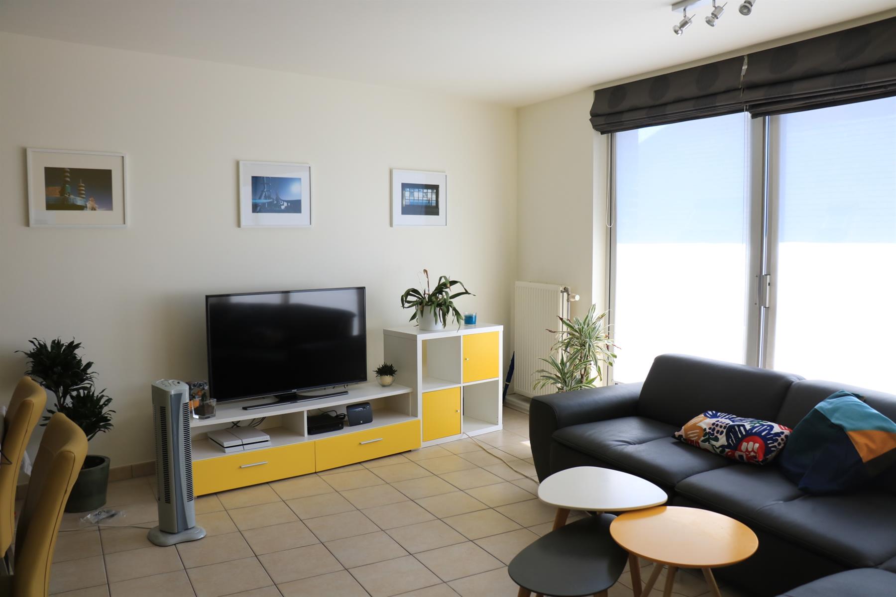 Recent duplexappartement gelegen aan de markt van Lennik. - foto 3