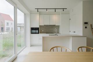 The house has a living area of 117m² and a sunny garden, ideal for enjoying peace and outdoor space.<br /><br />The layout is practical and well thought out:<br />- Entrance hall with guest toilet<br />- A fully equipped kitchen with modern finishes<br />- Bright living space with access to the garden<br />- A practical storage space<br />- 3 full bedrooms<br />- A fully equipped bathroom<br />- Attic accessible via a loft ladder<br /><br />Thanks to its convenient location, the center of Kortrijk is within walking and cycling distance, while the main access roads are also easily accessible. This makes the house ideal for both private occupancy and investment.<br /><br />Mandatory purchase of a carport or parking space. <br /><br />Are you looking for an energy-efficient home with a garden in a prime location in Kortrijk? Then this house in Sluis 9 is definitely worth a visit.<br /><br />Contact Alissia Dewitte - 0472 18 64 21 or Sarah Hanson - 0493 25 46 80 - to schedule a visit or more info.