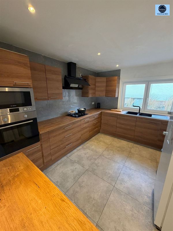 WONING MET HANDELSRUIMTE EN 3 SLAAPKAMERS - foto 4