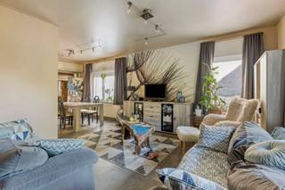 This spacious commercial property with residential space enjoys a prime location in the heart of Denderleeuw, in a busy and easily accessible...