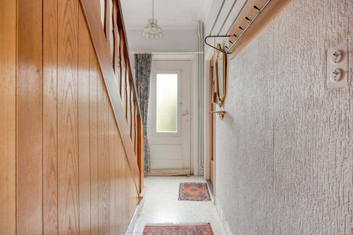 Te renoveren halfopen woning met mooie tuin in Brasschaat - foto 4