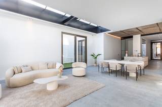 Extremely well-located loft of approx. 219 m² in Begijnenstraat. A wonderful location, between the Zuid and the equally trendy Mechelseplein with the adjacent Theaterbuurt. This central location guarantees easy accessibility, with public transport on your doorstep.<br /><br />This unique loft apartment is located on the ground floor of a rear building in this recent, small-scale development. The loft has been finished to a high standard with quality materials and offers a unique combination of space, light and comfort.<br /><br />The loft has a fully fitted open kitchen with a marble worktop in Emperador Beige marble and high-quality appliances from Miele: a built-in climate cabinet, combi-steam oven, combi-microwave oven, refrigerator and dishwasher. The spacious living area with sleek concrete flooring, large windows and skylights forms the heart of the home and is bathed in light all day long. The generous garden of approximately 73 m² with excellent privacy completes the picture.<br /><br />The flat also has a spacious master bedroom with an en-suite bathroom with a bath, walk-in shower and double sink. The second bedroom also has an en-suite bathroom with a walk-in shower and sink. Separate guest toilet.<br />
<p>A staircase leads to a lower-level space, creating a playful layout and offering an ideal area for a home office or additional lounge. Storage room with connection for a washing machine.</p>
Communal bicycle storage available.<br /><br />EPB in preparation.