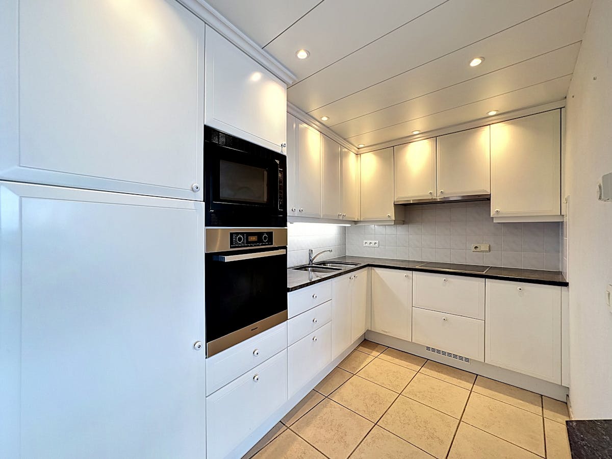 Appartement avec terrasse ensoleillée et spacieuse à louer à Heist - photo 5