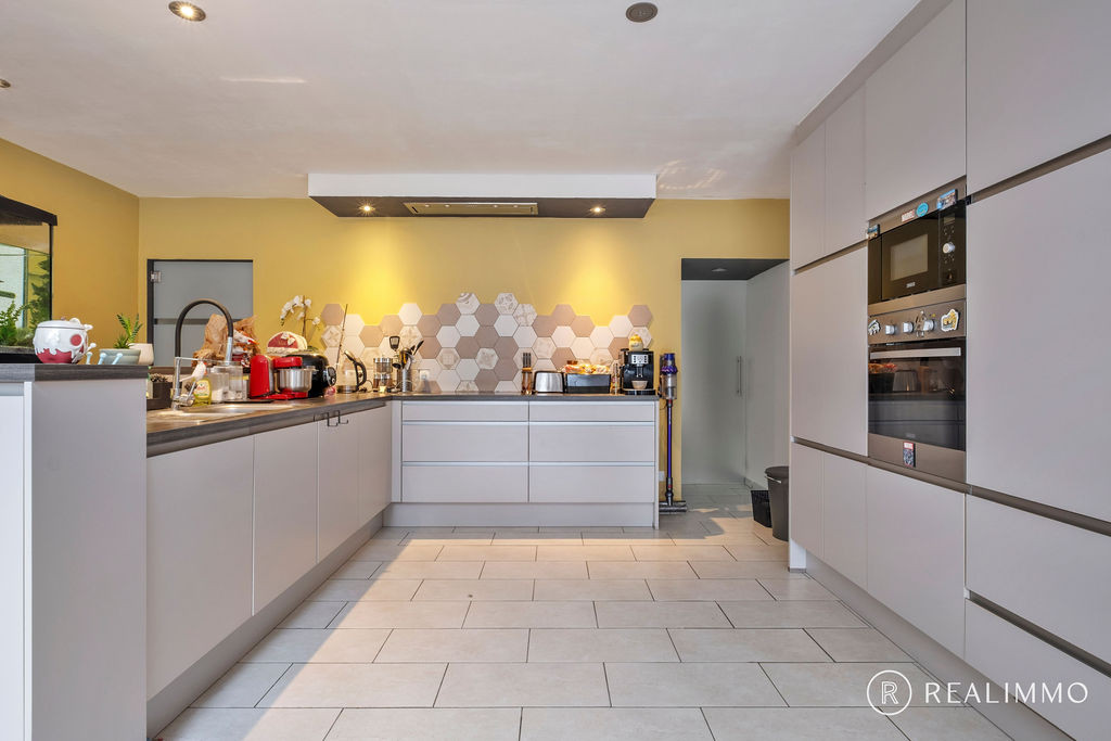 Gerenoveerde en energiezuinige gezinswoning in Aalbeke - foto 4