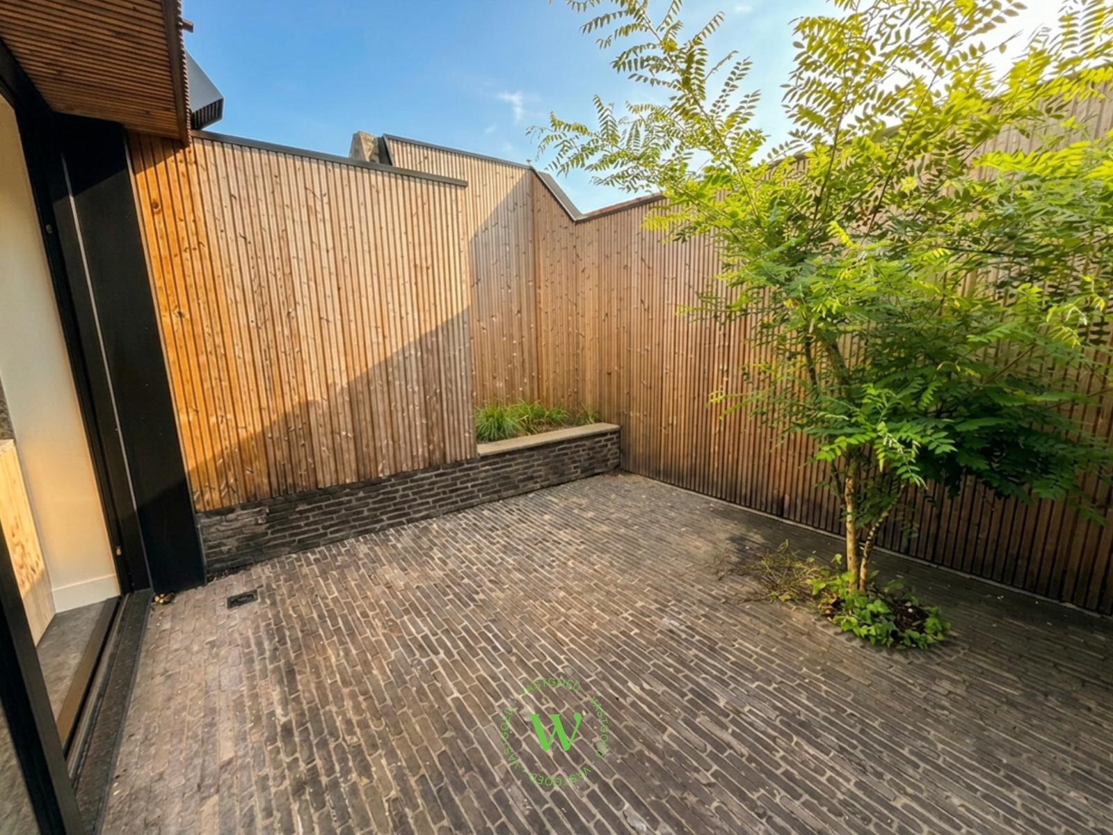 Volledig gerenoveerde woning met zonnige buitenruimte. - foto 5