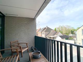Te huur, recent 2-slaapkamer appartement in OosterzeleOp een UITERMATE GUNSTIGE LIGGING te Oosterzele ontpopte zich dit AANGENAAM WOONPROJECT. De...