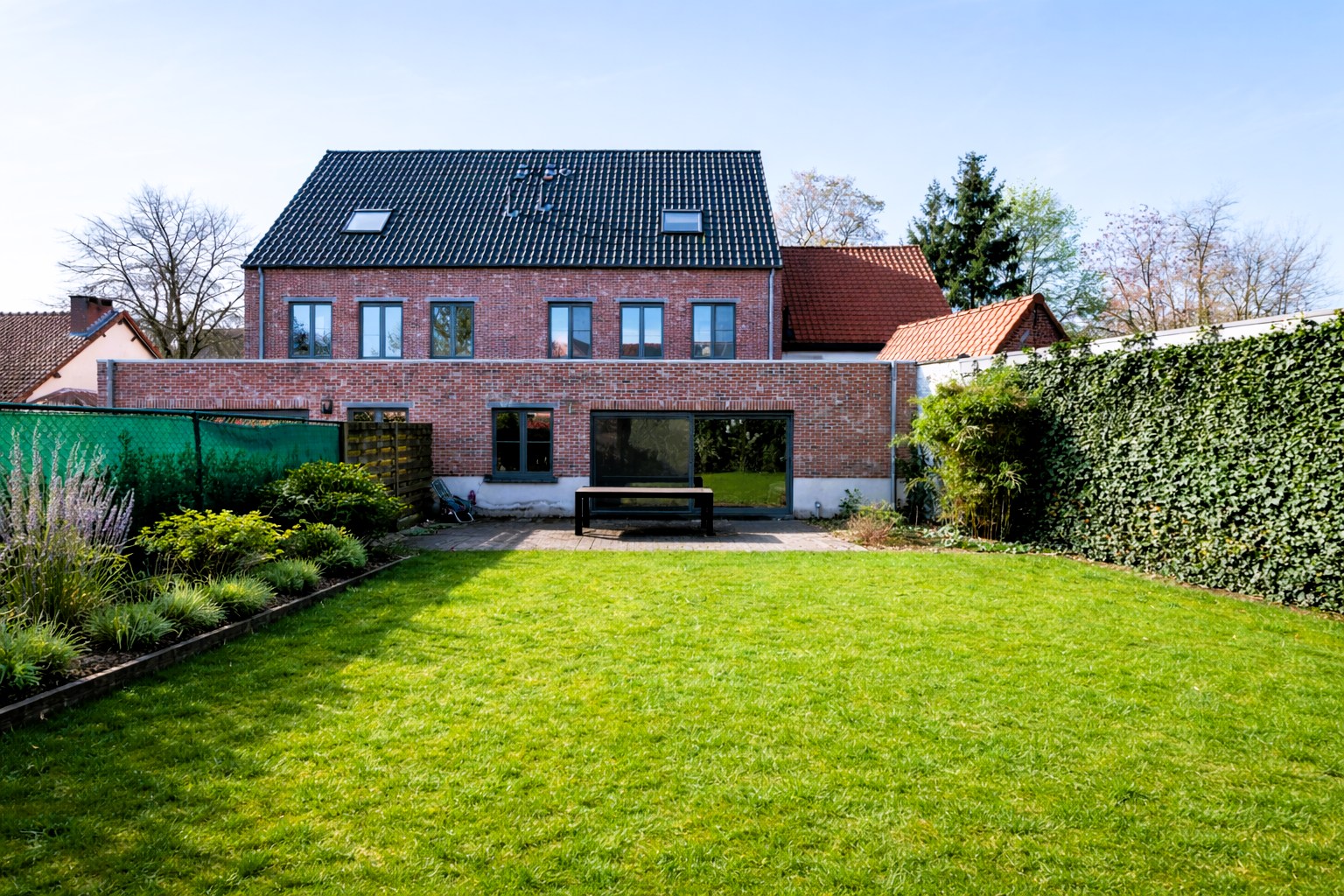 Ruime, energiezuinige gezinswoning met 4 slaapkamers - foto 2