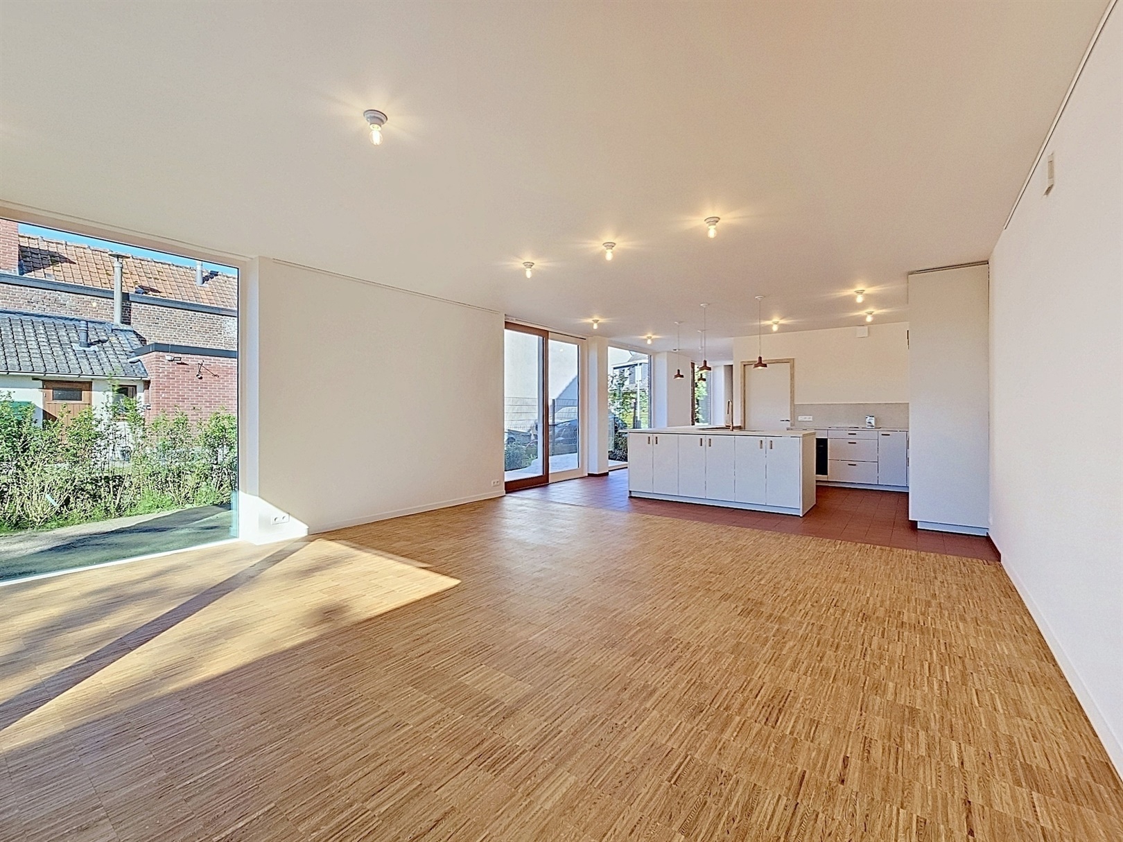 Stijlvolle architectenwoning met 4 slaapkamers, zonnige tuin én dakterras in groene omgeving - foto 4