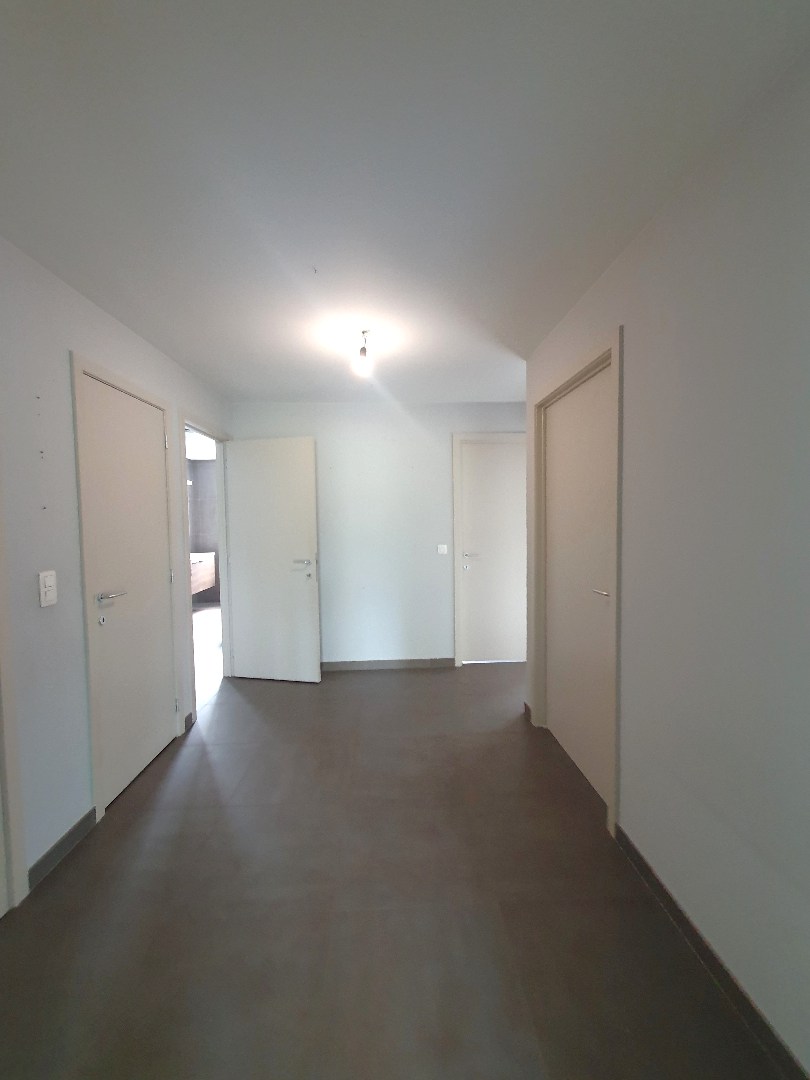 GELIJKVLOERSAPPARTEMENT (2011) MET TUIN EN ONDERGRONDSE PARKING: - foto 4