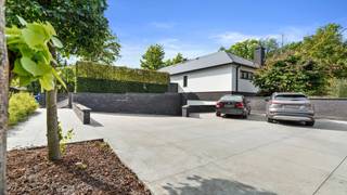 Exclusieve villa in prestigieuze villawijk ‘Zilverkust’ te Rekem – luxueus wonen in een groene oase nabij MaastrichtIn de gegeerde en bosrijke...