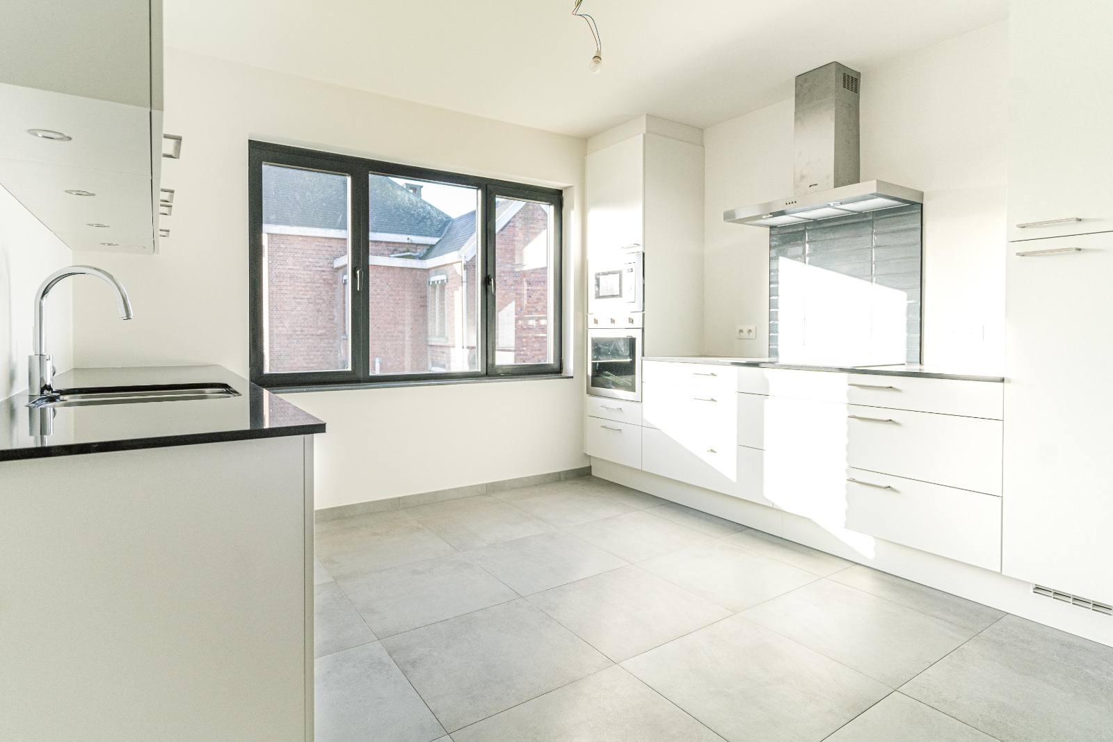 Compleet gerenoveerd duplex appartement met 3 slaapkamers te Belsele - foto 3