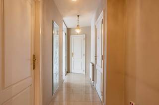 With 124 m² of living space, you will have plenty of room here. You enter through the hallway and walk straight into the bright living room with open kitchen. The kitchen is fully equipped with, among other things, a double American refrigerator, built-in deep fryer, oven, microwave, dishwasher and double sink. Next to the kitchen is a separate storage room with extra storage space.<br />There are two bedrooms, one of which has a dressing room. There is a built-in cupboard in the hallway. There is also a separate toilet and a bathroom with a bath, shower, toilet and double washbasin. Outside there is a small balcony.<br />Advantages:<br />Energy efficient (good EPC)<br />Electricity compliant! <br />Recently renovated roof of the building<br />Underground parking space and spacious basement storage room (mandatory purchase: €30,000)