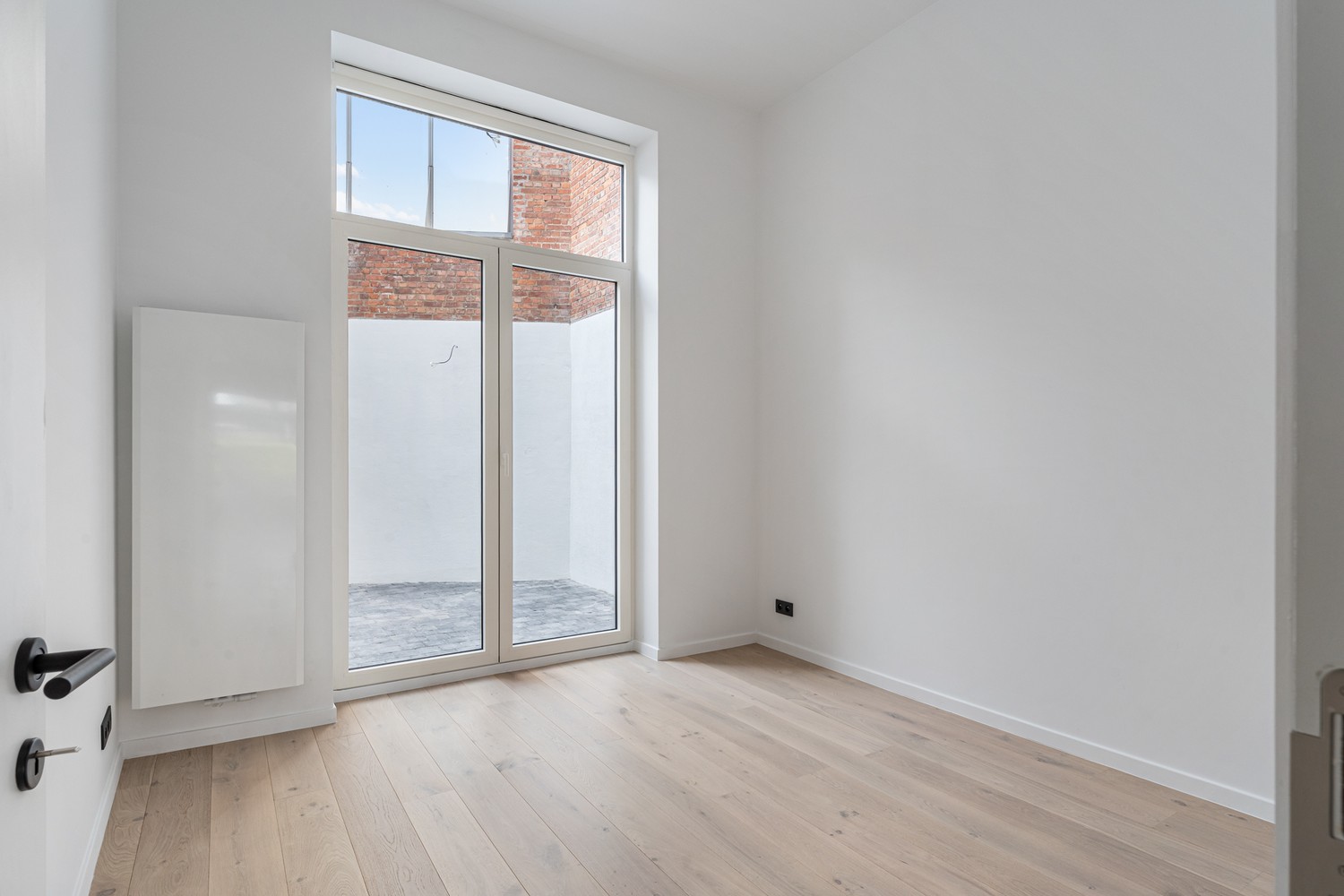 Gelijkvloers en gerenoveerd appartement met 1 slaapkamer en een ruim terras nabij het station van Leuven! - foto 5