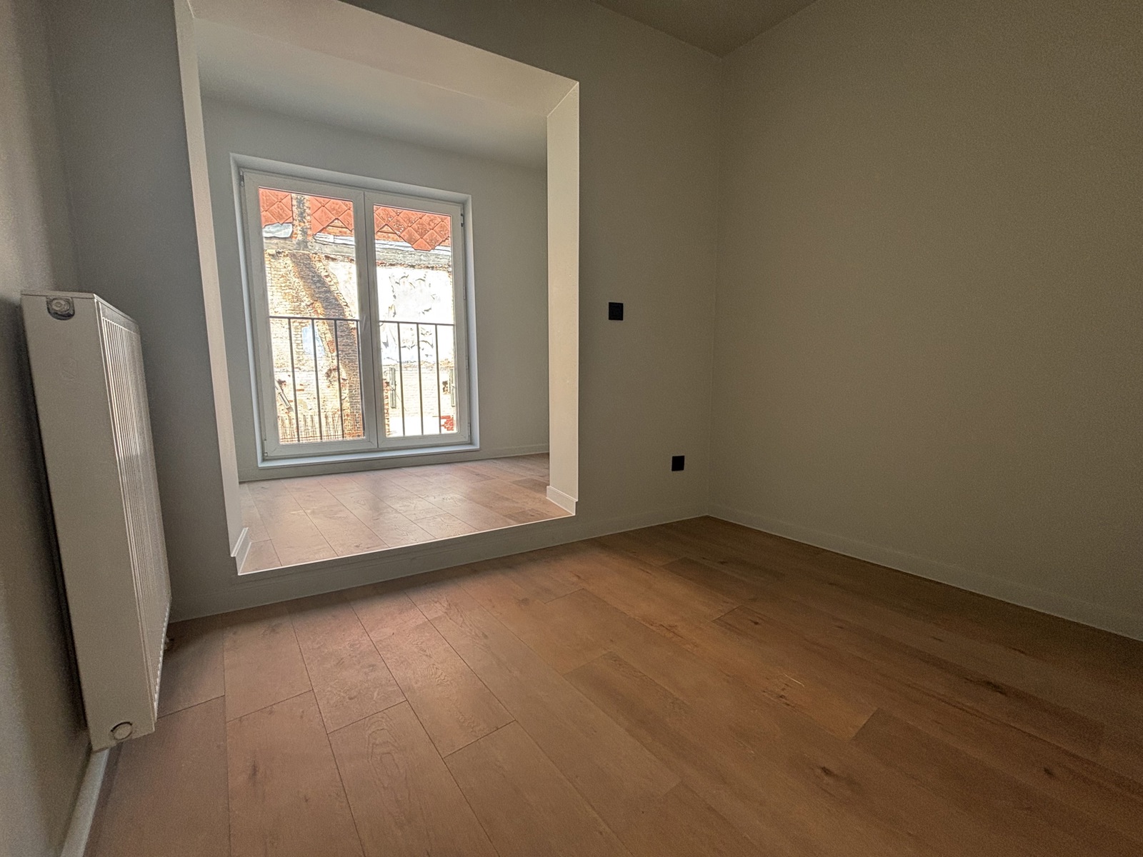Stadswoning met autostaanplaats - foto 4