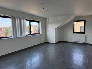 Sunny rooftop apartment with 1 bedroom, living room with open kitchen, bathroom, storage room, basement, sun terrace and bike storage.