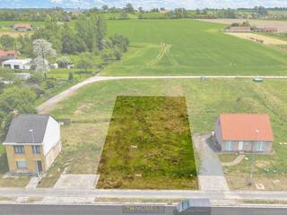 Mooi perceel bouwgrond voor VILLAWONING en met een ZUIDELIJKE ORIËNTATIE te Oudenaarde.Gelegen langs de N46 (Oudenaarde-Zwalm), deze gewestweg is...