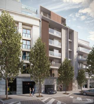 Zeer ruim appartement op de <strong>4de verdieping</strong>, indeling nog verder te bepalen volgens keuze van de koper. In het basisplan zijn er 3 slaapkamers waarvan een master met eigen dressing ruimte en badkamer. Er is een 2de badkamer met douche voor de 2 andere slaapkamers. Verder is er de woonruimte over de volledige breedte van het gebouw met een ruim terras, open keuken, eethoek en zithoek. De totale terras oppervlakte voor -en achter is 25,4 m2