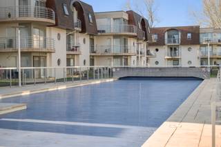 Te koop: gezellig appartement in de Derbylaan, Bredene, gelegen in een residentiële omgeving met toegang tot een gemeenschappelijk zwembad en...