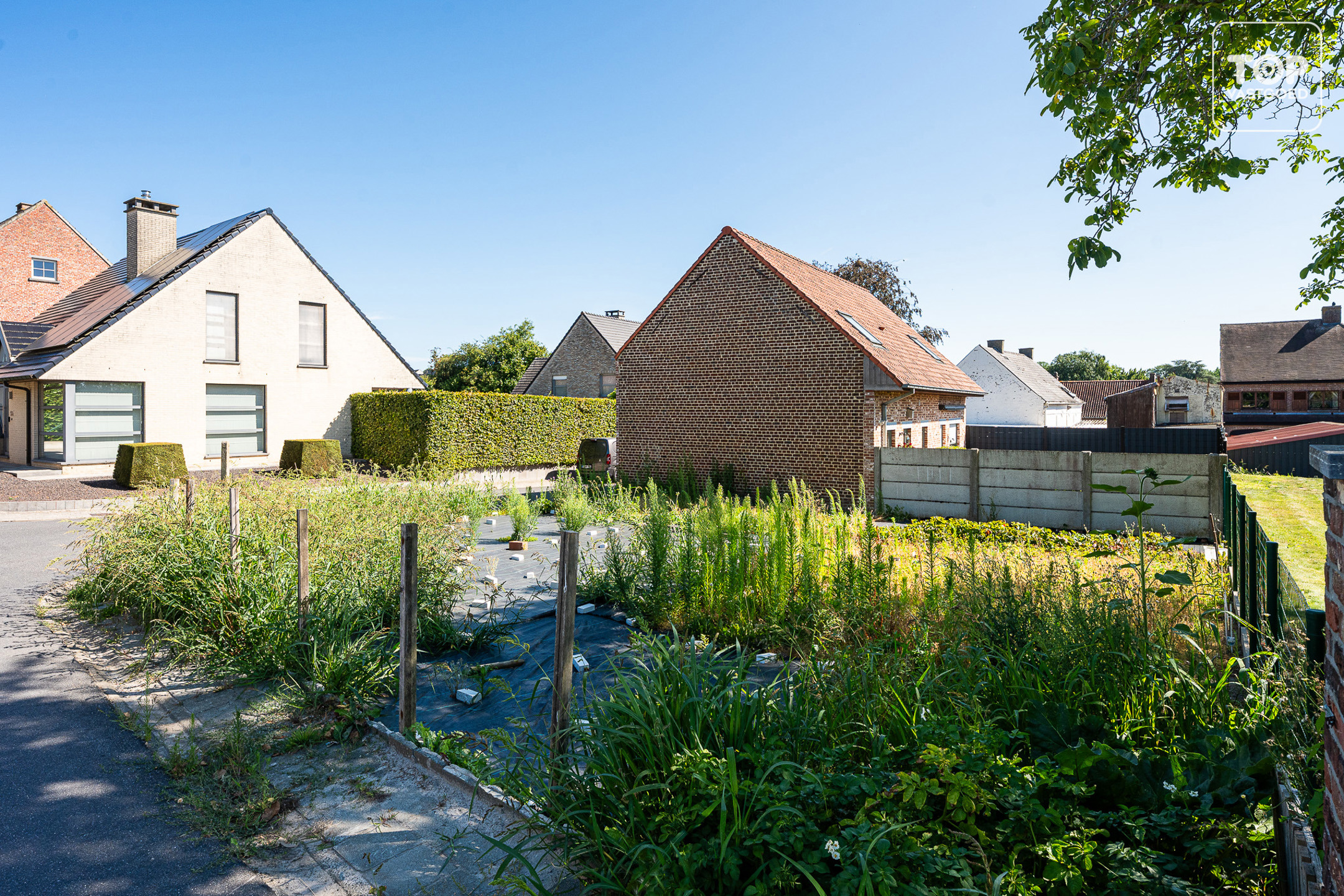 Bouwgrond voor half open bebouwing op toplocatie - foto 4