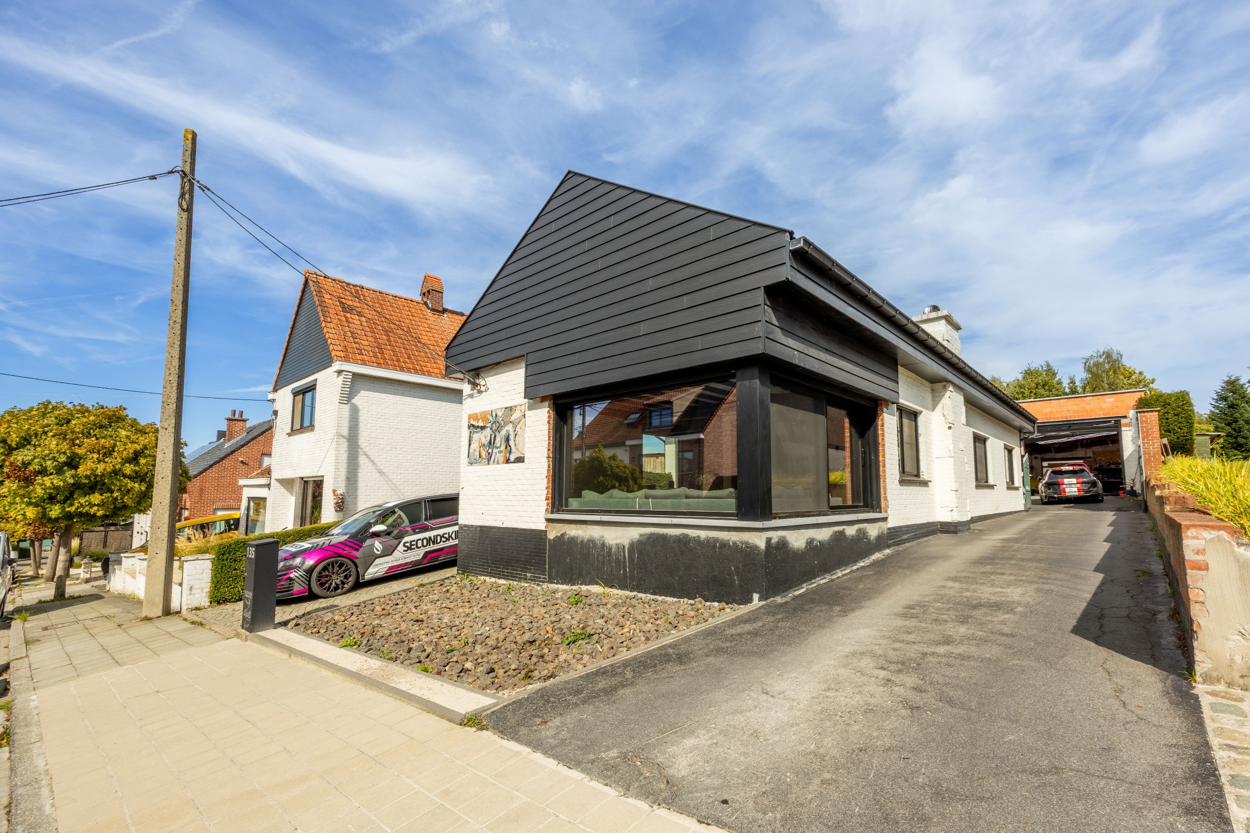 ALLEENSTAANDE GELIJKVLOERSE WONING MET MAGAZIJN EN COMMERCIELE RUIMTE - foto 2