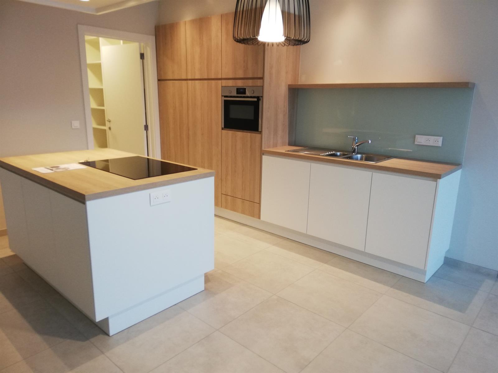 Prachtig gelijkvloers appartement met tuin - foto 2