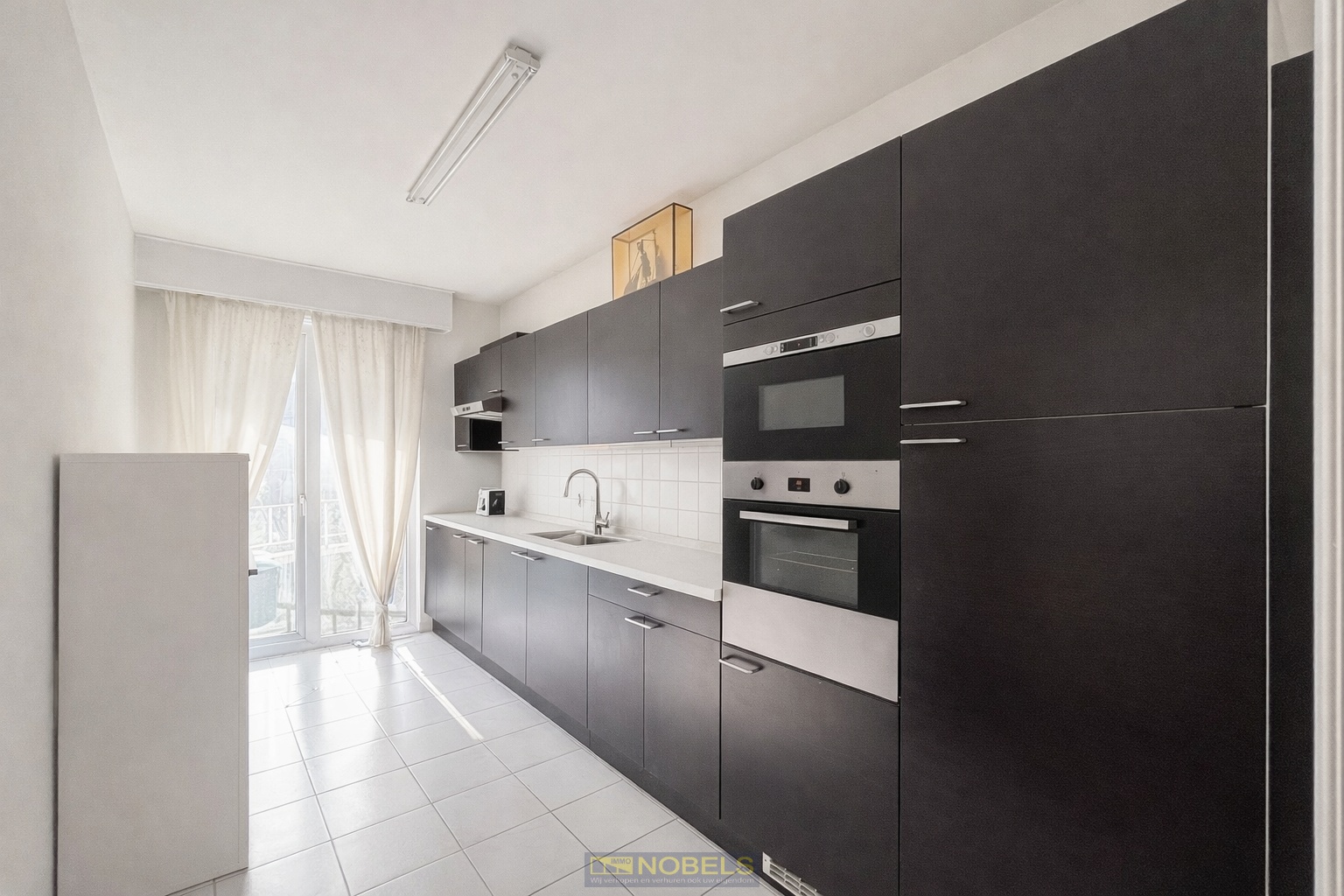 Te huur, energiezuinig appartement met 2 slaapkamers, 2 terrassen en een afgesloten garagebox in Gent - photo 2