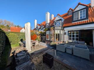 Exclusief te koop: Charmante instapklare woning met een gezellige tuin en een zonnig terras, ideaal gelegen vlakbij het Oosthoekplein in Het...