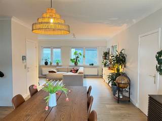 This ground-floor apartment is located within walking distance from the center of Mechelen and near the E19 Mechelen-Brussels exit.The apartment comprises a spacious living room followed by a fitted kitchen opening onto the terrace.Furthermore, the apartment has an entrance hall, night hall, 2 bedrooms, laundry room and a bathroom with bathtub, single sink and toilet.The terrace with a surface of 35m² also offers the possibility of placing a bicycle.There are no common charges, all utilities are individual.The windows and doors were recently renewed, in other words, the energy value of this property will evolve positively compared to the published value.