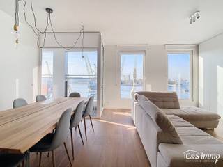 Hedendaags volledig gerenoveerd appartement (ca 75m²) met frontaal uitzicht op de Schelde in een monumentaal gebouw op het Eilandje. Woon- en...