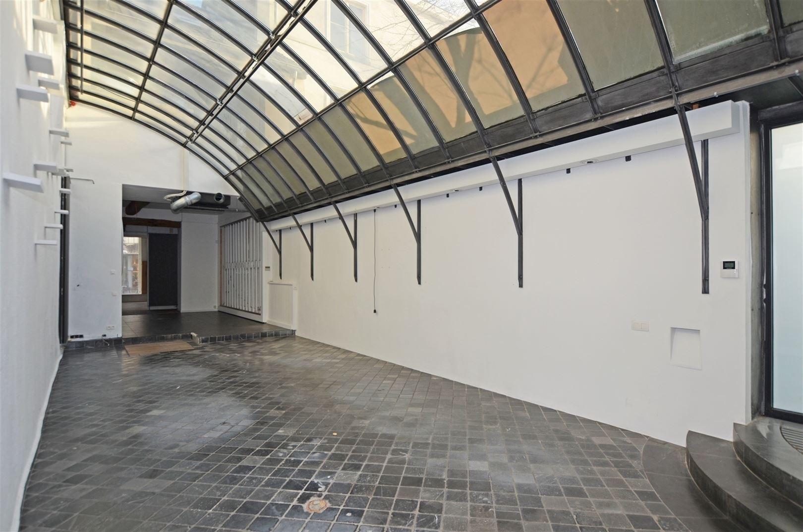 Uniek neoclassicistisch herenhuis met handelspand & duplexwoning - foto 5