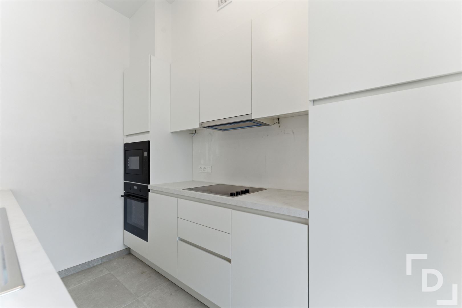 Nieuwbouwappartement met 2 terrassen te koop in centrum Ieper. - foto 5