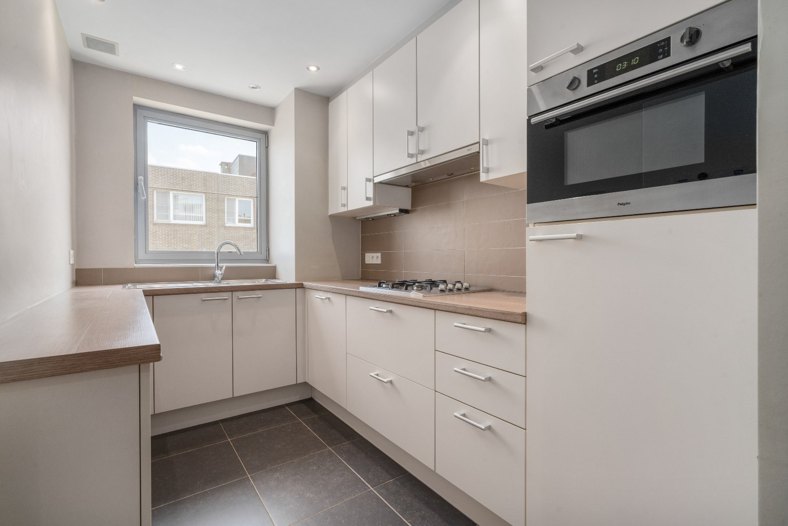 Lichtrijk 2-slpk appartement met garage - foto 4