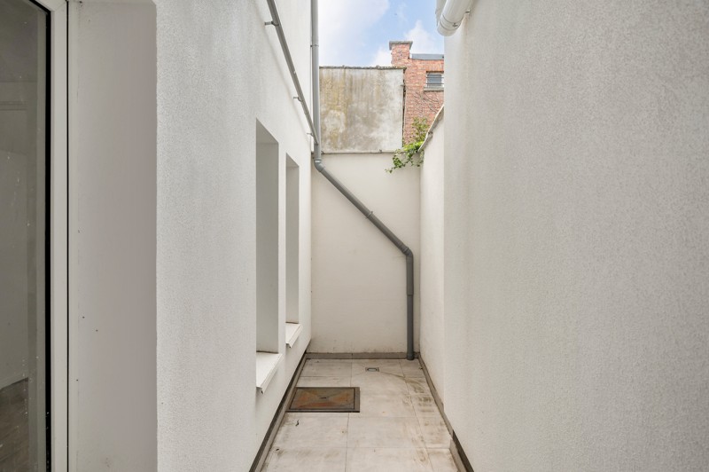 Gerenoveerd Gelijkvloers appartement met terras te Wilrijk - foto 2