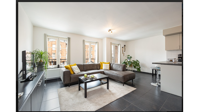 Een centraal gelegen appartement met overdekte autostaanplaats - foto 5