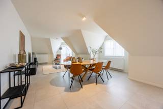 Right in the center of Nieuwpoort-Stad, with shops, restaurants, and the market within walking distance, we find this move-in ready duplex apartment in the recent residence Maiden Lane. The living space is stylishly finished and fully painted, so you can move in right away without any additional work.<br /><br />The duplex apartment is located on the 3rd and 4th floor and is laid out as follows:<br />Entrance hall with separate toilet and storage room, open fitted kitchen, bright living room, and the first bedroom. On the upper floor, we find the very spacious second bedroom, storage room, and a fitted bathroom connected by a staircase.<br /><br />Advantages:<br />- Recent residence (2021)<br />- Favorable EPC A<br />- Central location in the center of Nieuwpoort<br />- Two cellar storage rooms included in the price<br />- Possibility to purchase a parking space<br /><br />Want to see more and know more about this property? Be sure to watch the video on our website or contact us for a visit.