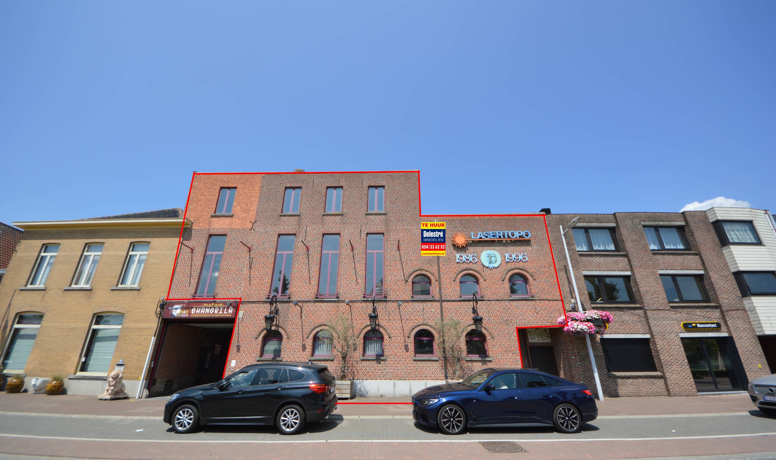 Uniek commercieel gebouw te huur in hartje Herzele – voormalig brouwerijpand met karakter en ruimte - foto 1