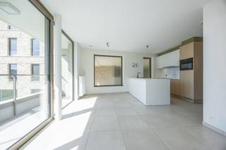 Discover this <strong>recently</strong> <strong>completed</strong> <strong>and</strong> <strong>move-in ready</strong> <strong>new build apartment</strong> in the stylish <strong>Residence</strong> <strong>Odrada</strong>, superbly located on Westendelaan in Middelkerke. Thanks to its tranquil location, within walking distance of the beach, the new casino, shops, restaurants, and public transport, you will enjoy a perfect combination of comfort, peace, and a vibrant coastal atmosphere.<br /><br />This bright apartment of <strong>78 m²</strong>, situated on the <strong>first</strong> <strong>floor</strong>, has been finished with high-quality materials and a contemporary design. The spacious living area with large windows is bathed in natural light and opens directly to the pleasant terrace, where you can enjoy the open view in peace.<br /><br />The <strong>fully equipped open kitchen</strong> features all modern appliances and seamlessly connects to the living area, making it ideal for cozy moments with family or friends. Furthermore, the apartment includes two full-sized bedrooms, a stylish bathroom with <strong>walk-in shower and double sink</strong>, a separate guest toilet, and <strong>a practical storage area</strong>, ensuring extra storage space and optimal living comfort.<br /><br />The residence also offers a <strong>communal</strong> <strong>bicycle storage</strong> and, thanks to the excellent <strong>EPC label A</strong>, you will live here in a particularly energy-efficient and future-oriented way.<br /><br />Whether you are looking for a <strong>permanent residence, a second home by the sea, or a profitable investment</strong>, this apartment provides all the advantages to meet your expectations. The sale takes place under the <strong>21% VAT regime</strong>, but if you meet the legal requirements, you can benefit from the <strong>reduced VAT rate of 6%.</strong><br /><br /><u>The purchase of an underground parking space is mandatory and costs € 35,000 excluding fees.</u><br /><br /><strong>Highlights</strong>
<ul>
<li>New build</li>
<li>2 bedrooms</li>
<li>EPC A</li>
<li>Prime location</li>
<li>6% VAT possible</li>
</ul>
Interested in this qualitatively finished new build apartment in a prime location on the Belgian coast? Contact us today for a visit and discover the comfort, space, and excellent location of this unique living opportunity.