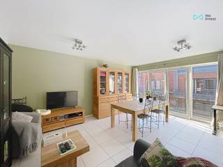 We Invest Namur vous propose cet appartement 2 chambres avec bureau et une terrasse, idéalement situé au sein de la résidence La Sucrerie à...