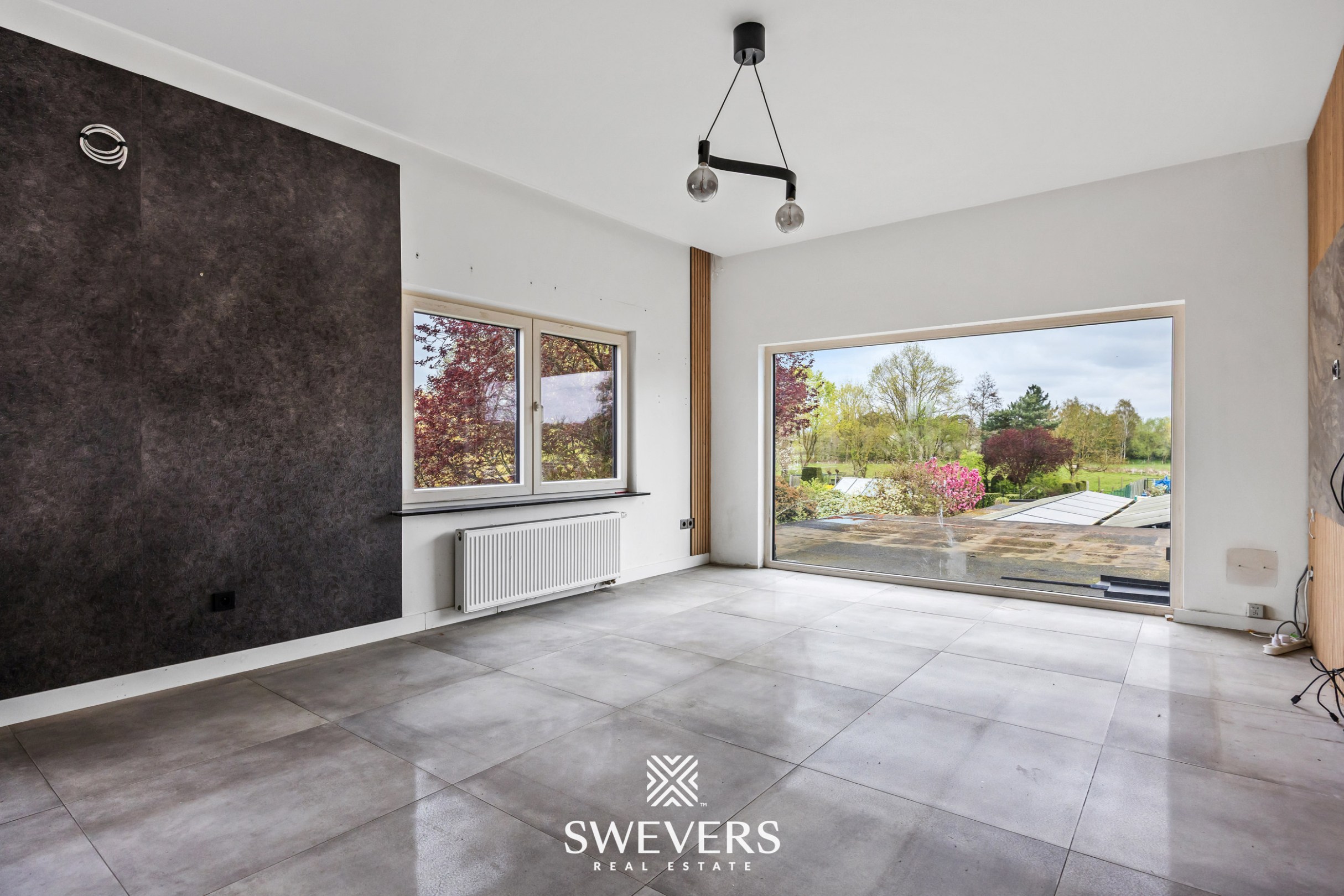 Ruim appartement met gemeenschappelijke tuin te Lummen - foto 4