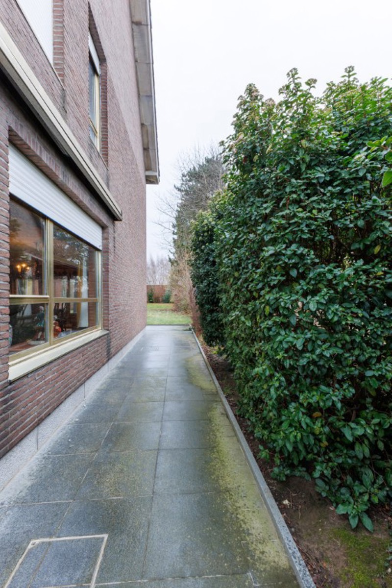 Ruime halfopen bebouwing met grote tuin - foto 3