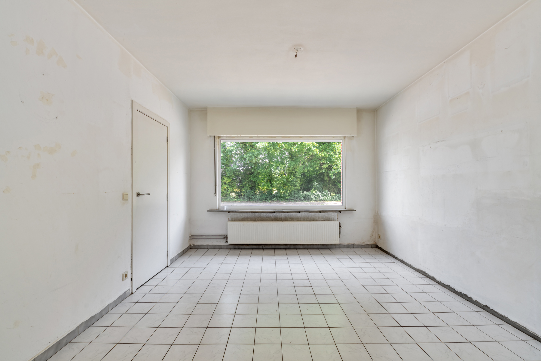 Charmant renovatieproject met 2 slpk en zonnige tuin - foto 3