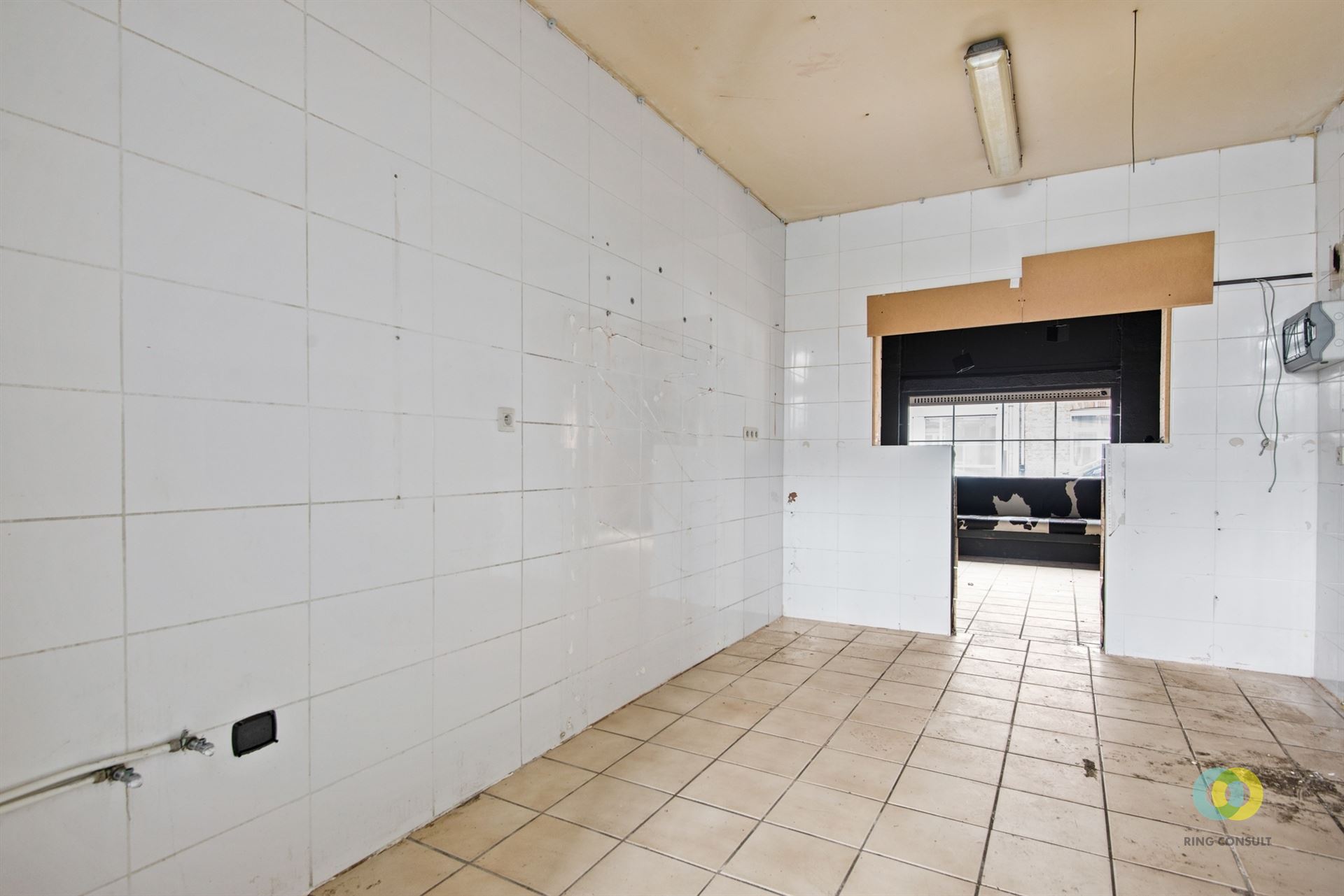 Handelshuis met bovenliggend duplexappartement - foto 4