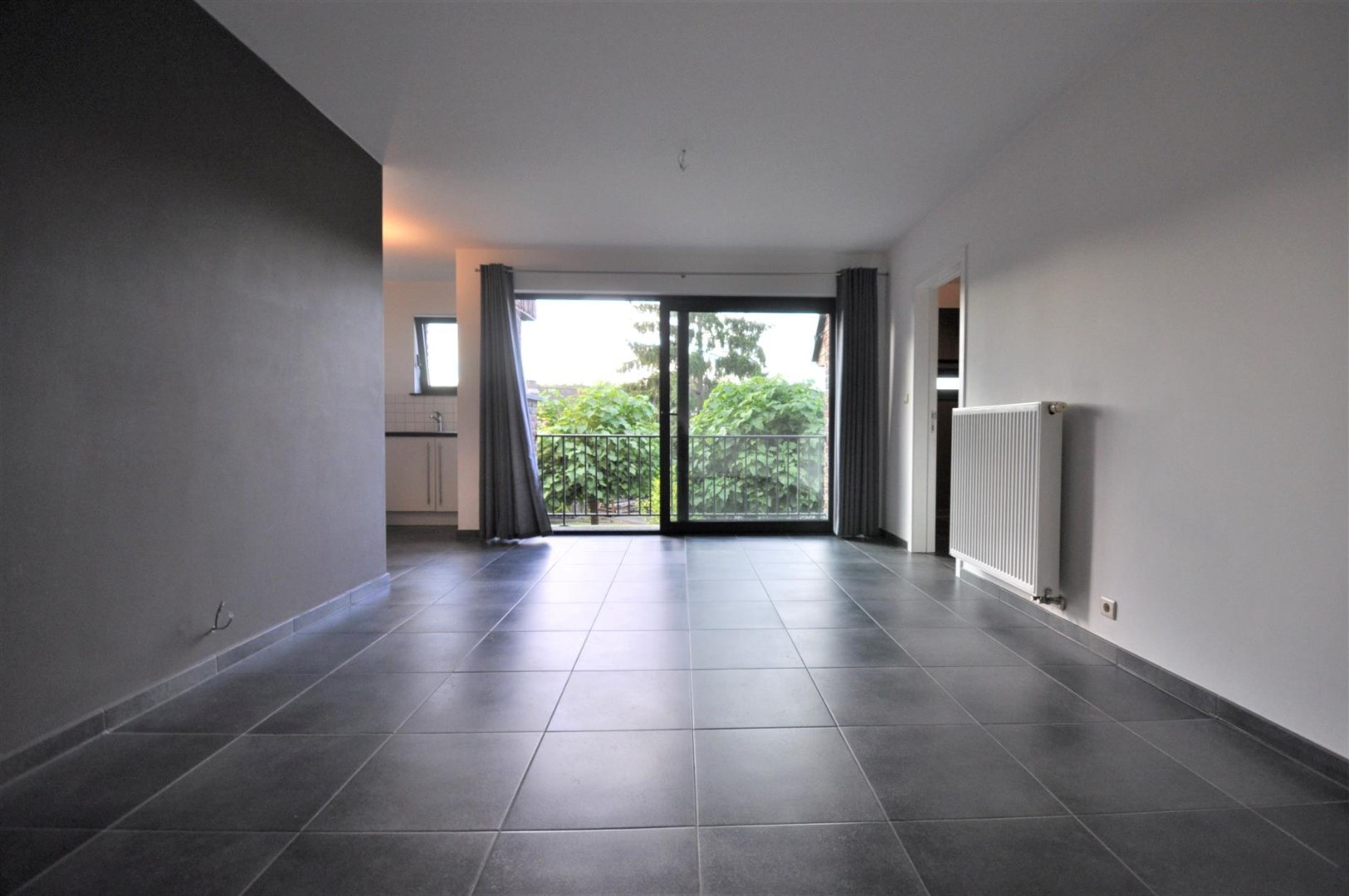 1-slaapkamerappartement op 1e verdieping te Merelbeke met parkeerplaats - foto 2