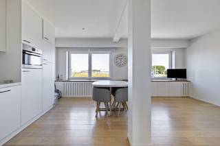 Are you looking for a special apartment for sale in Zeebrugge? This bright and spacious apartment, with a living area of 77m², offers an exceptional living experience in the heart of Zeebrugge. The recent renovation of the cellar/studio in 2023, together with the refurbishment works in the apartment itself, guarantees a ready-to-move-in home. This property is a great opportunity for those who want to buy in a vibrant coastal city.Layout:- entrance hall with toilet- bright living space with open kitchen- living room- bedroom 1- bedroom 2- bathroom with shower- access to a private roof terrace- access to private cellar/studio with courtyardThis opportunity is an ideal opportunity for those looking for a good investment with a rental return, second home or permanent home. Located in a good location in Zeebrugge near the beach, sea and roads to Bruges and the coast. There is also a communal bicycle shed.Don't miss out on this unique opportunity to buy this beautiful apartment for sale in Zeebrugge. Would you like more information or a visit? Feel free to contact us via knokke@dewaele.com or 050 612 612