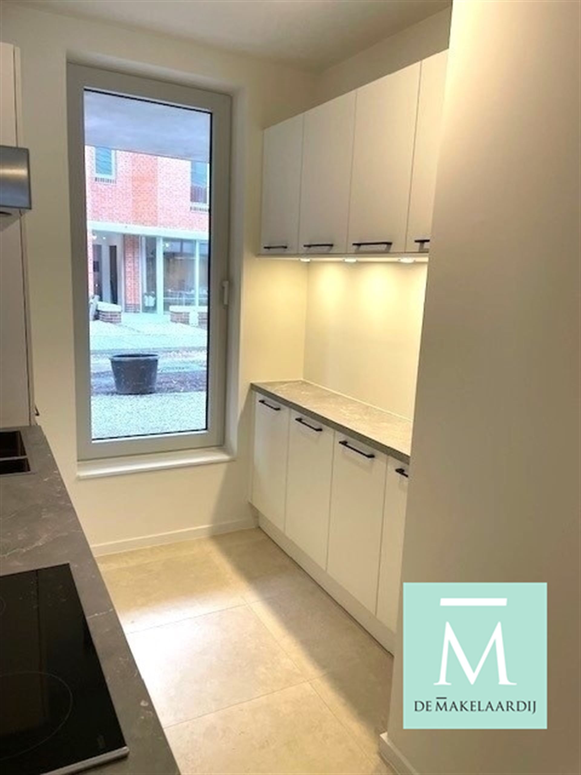 Gelijkvloers nieuwbouwappartement met 2 slaapkamers, terras/tuin op toplocatie! - foto 2