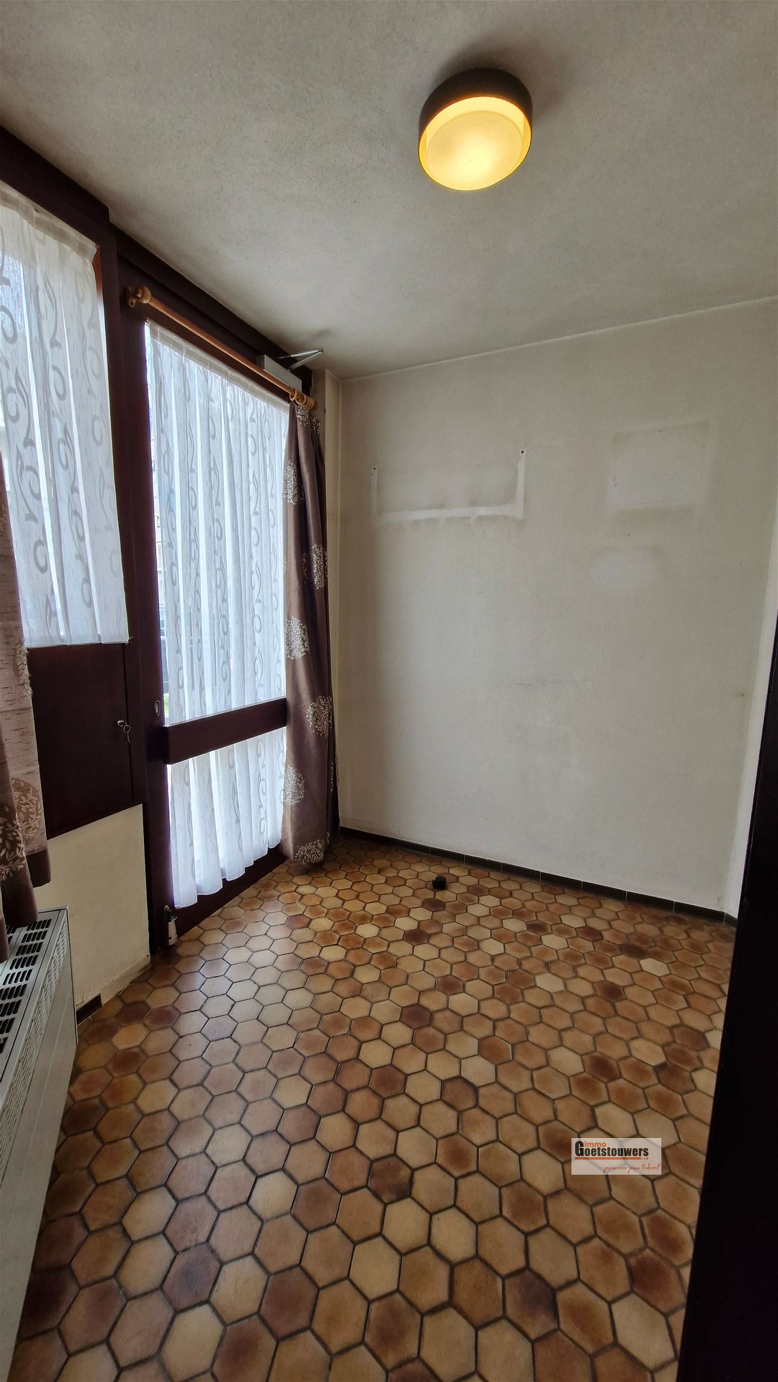 Woning met 2slpks, tuin en terras - op te frissen - foto 2