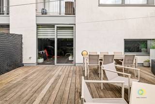 <p><span>Discover this excellently maintained ground floor apartment in Vilvoorde, located in a recent building (2013) with elevator, just outside the center. Thanks to its convenient location, you enjoy easy accessibility, while the nearby Hazeweide Park provides a pleasant green environment.  The large windows provide natural light in the spacious living area. Here there is ample space for a comfortable seating area and a dining area, which together form one harmonious unit with the open kitchen. The kitchen is equipped with all contemporary comforts and features a practical worktop that can also serve as a breakfast nook. Next to the kitchen is a useful storage room with plumbing for a washing machine and dryer, as well as additional storage space next to the dining area. The living area provides access to the spacious and pleasant terrace, where you can enjoy the outdoors in peace and quiet. The entrance hall separates the living and sleeping areas. The apartment has two bedrooms, a modern bathroom with bathtub, shower function and sink, complemented by a separate shower room. Furthermore,  there is a separate toilet. As an added bonus, a closed garage box in the underground parking lot is included in the price. Thanks to its excellent state of repair, practical layout, green surroundings and included garage, this apartment is not only an ideal home, but also an interesting investment opportunity. </span></p><p><span> </span></p>